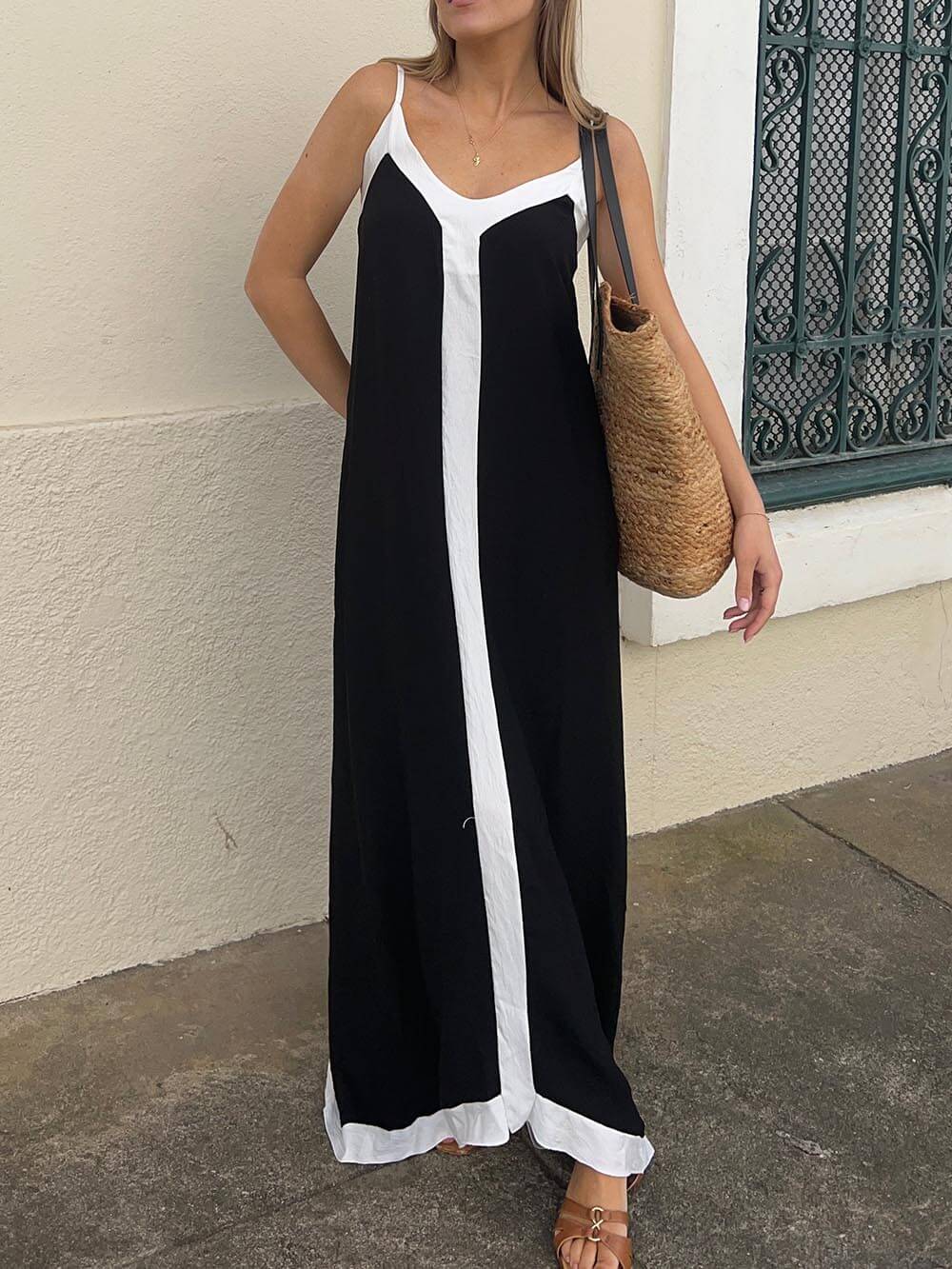 Carenza - Mouwloze maxi zomerjurk met contrasterende randen