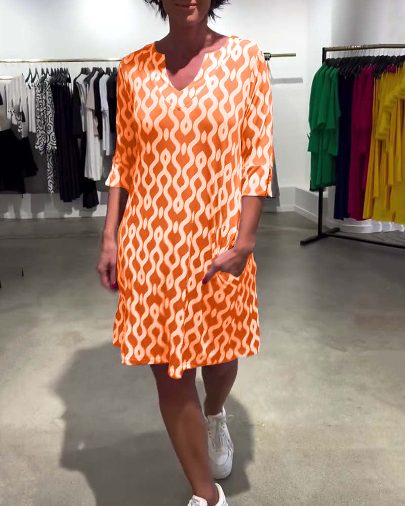 Ludmila - Zomerjurk met grafische print en v-hals voor dames