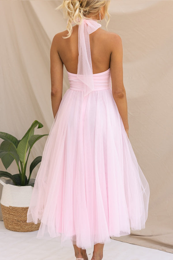 Fidelia - Halter midi jurk met volumineuze rok