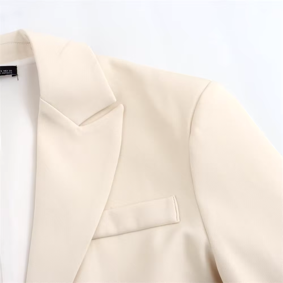 Dyna - Vintage beige dubbele knoop