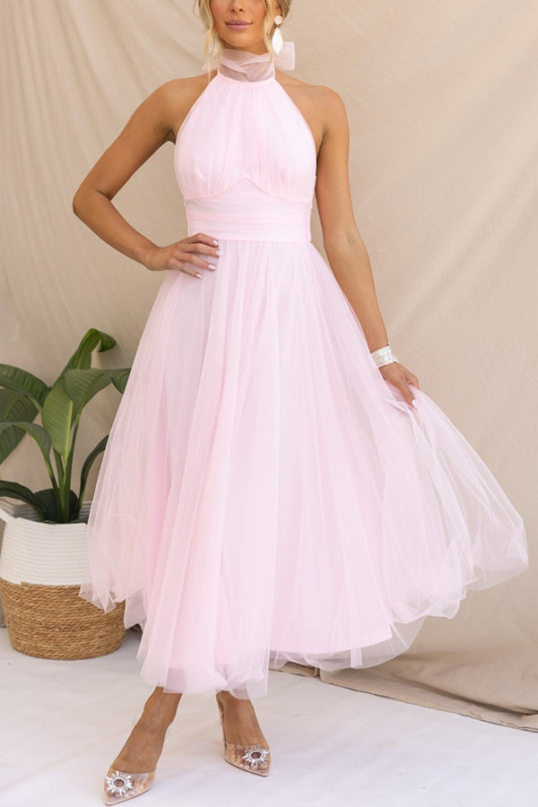 Fidelia - Halter midi jurk met volumineuze rok