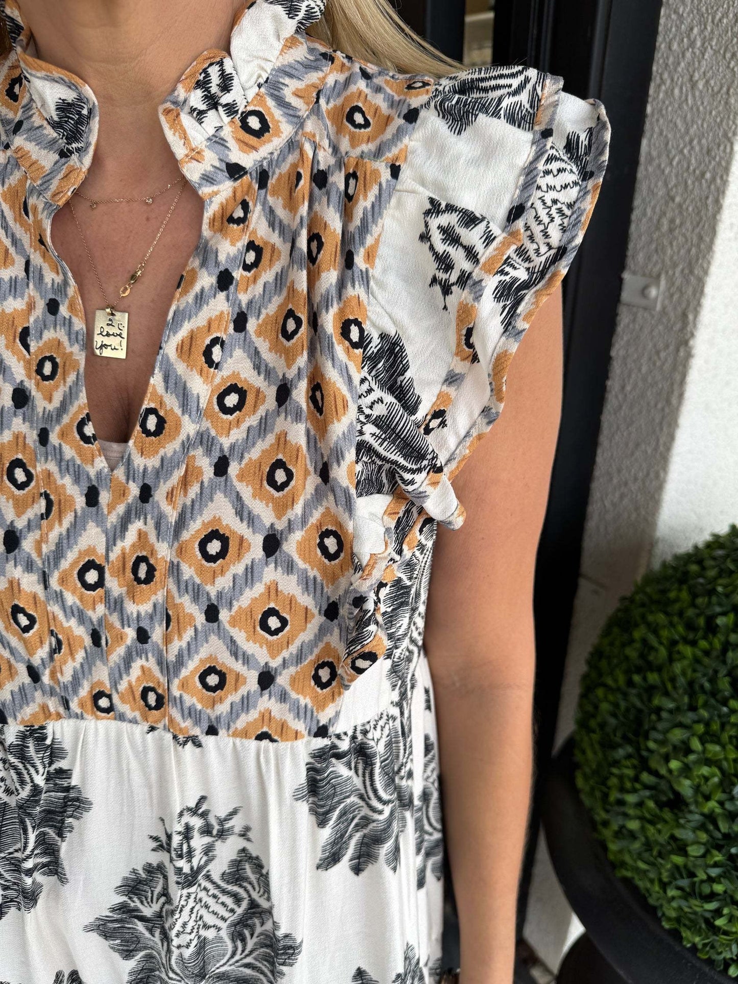 Birgit - Mouwloze zomerjurk met volantkraag en bloemenprint