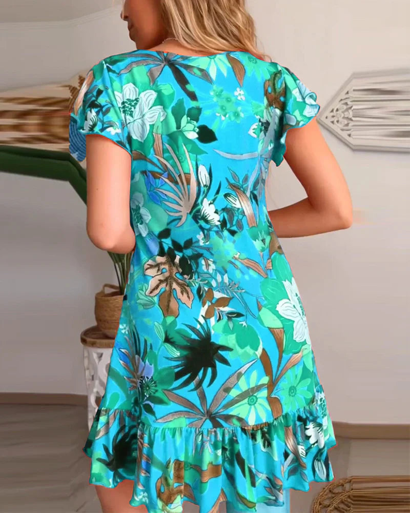 Nirella - Dames korte zomerjurk met v-hals, ruches en speelse mouw
