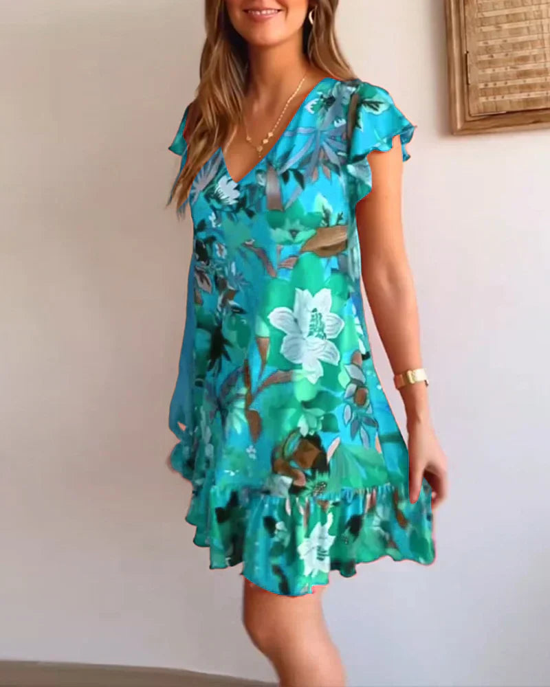 Nirella - Dames korte zomerjurk met v-hals, ruches en speelse mouw