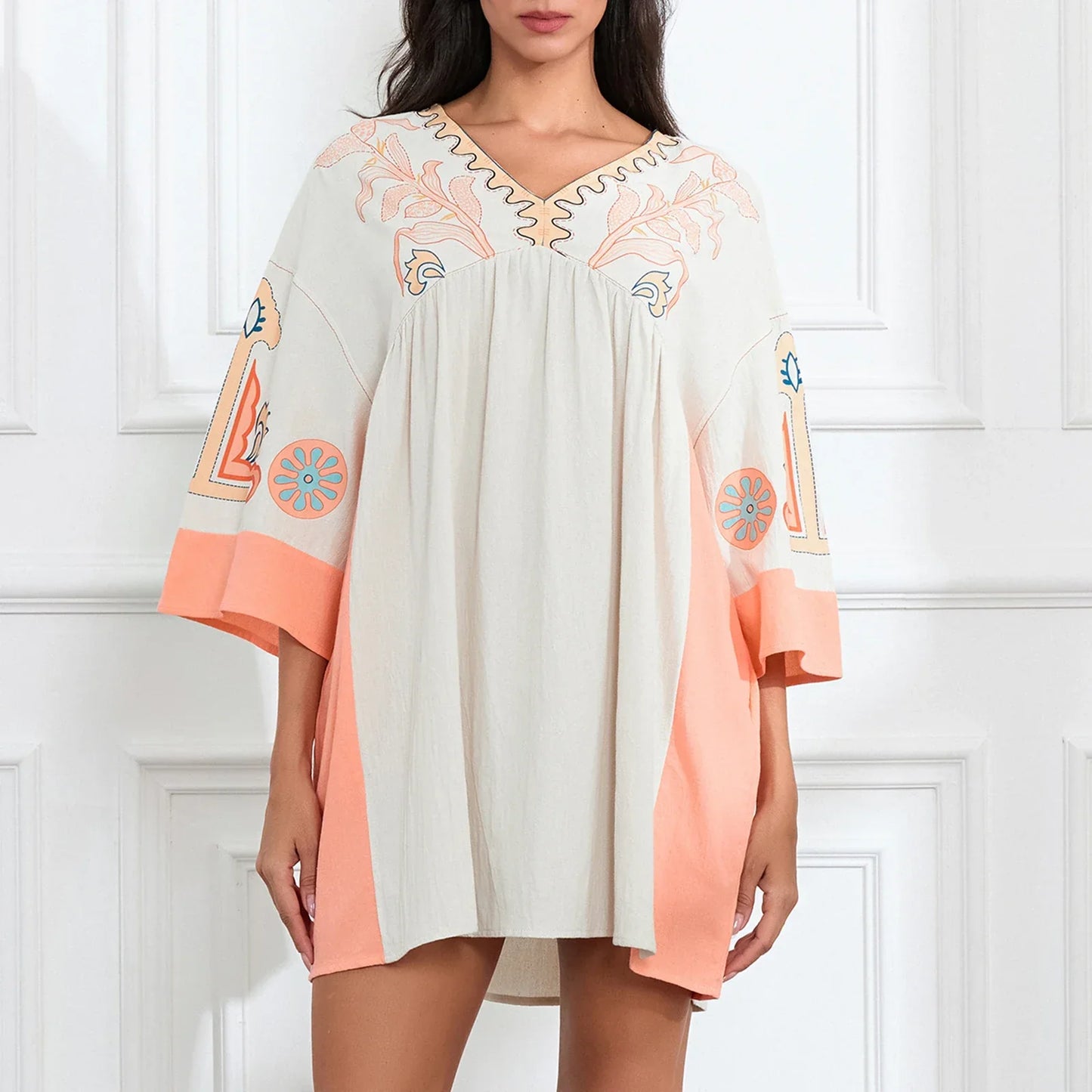 Mabelle – Dames tuniekjurk met v-hals en geborduurde details
