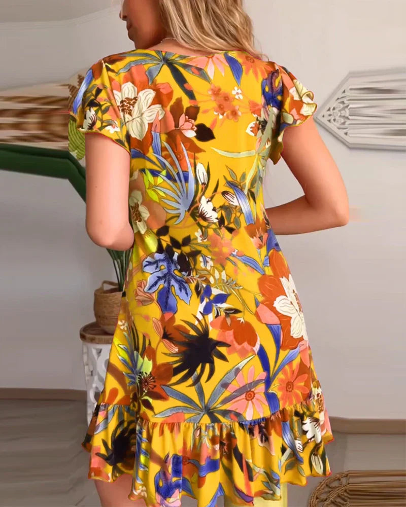 Nirella - Dames korte zomerjurk met v-hals, ruches en speelse mouw