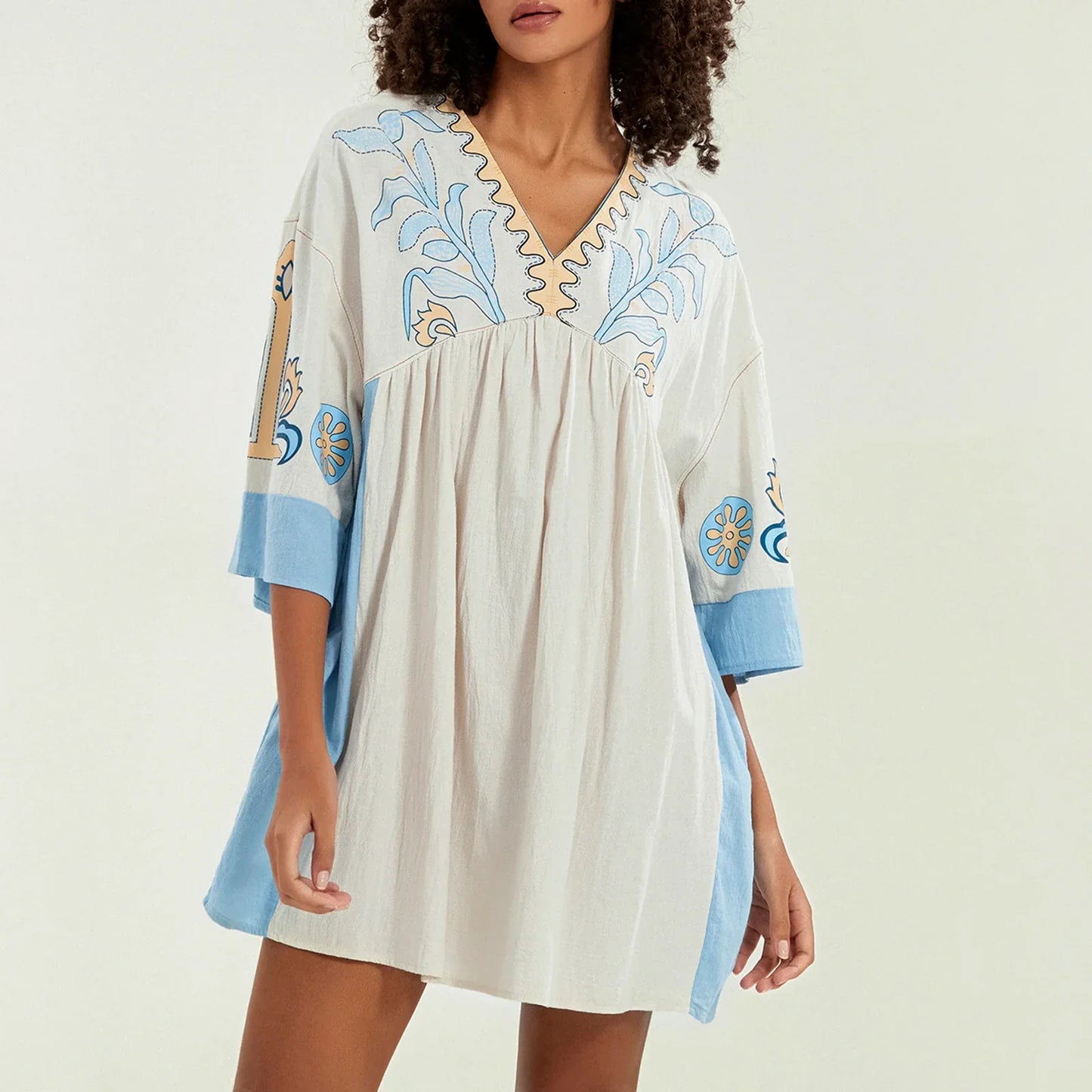 Mabelle – Dames tuniekjurk met v-hals en geborduurde details