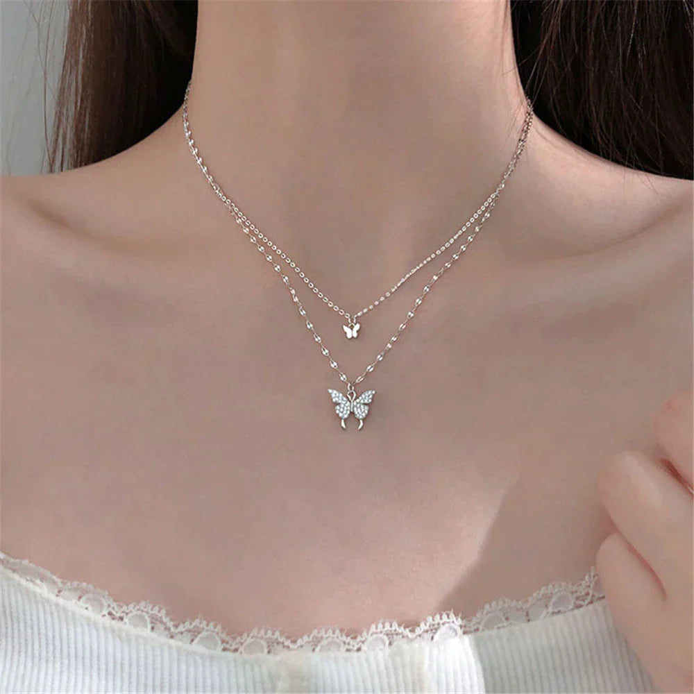 Damesketting met dubbele laag en vlinderdetails