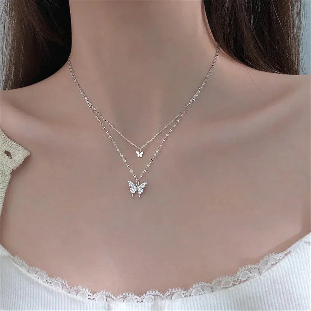 Damesketting met dubbele laag en vlinderdetails