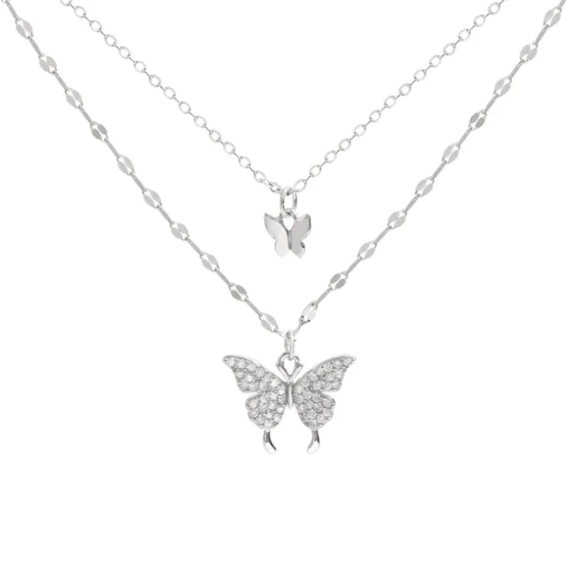 Damesketting met dubbele laag en vlinderdetails