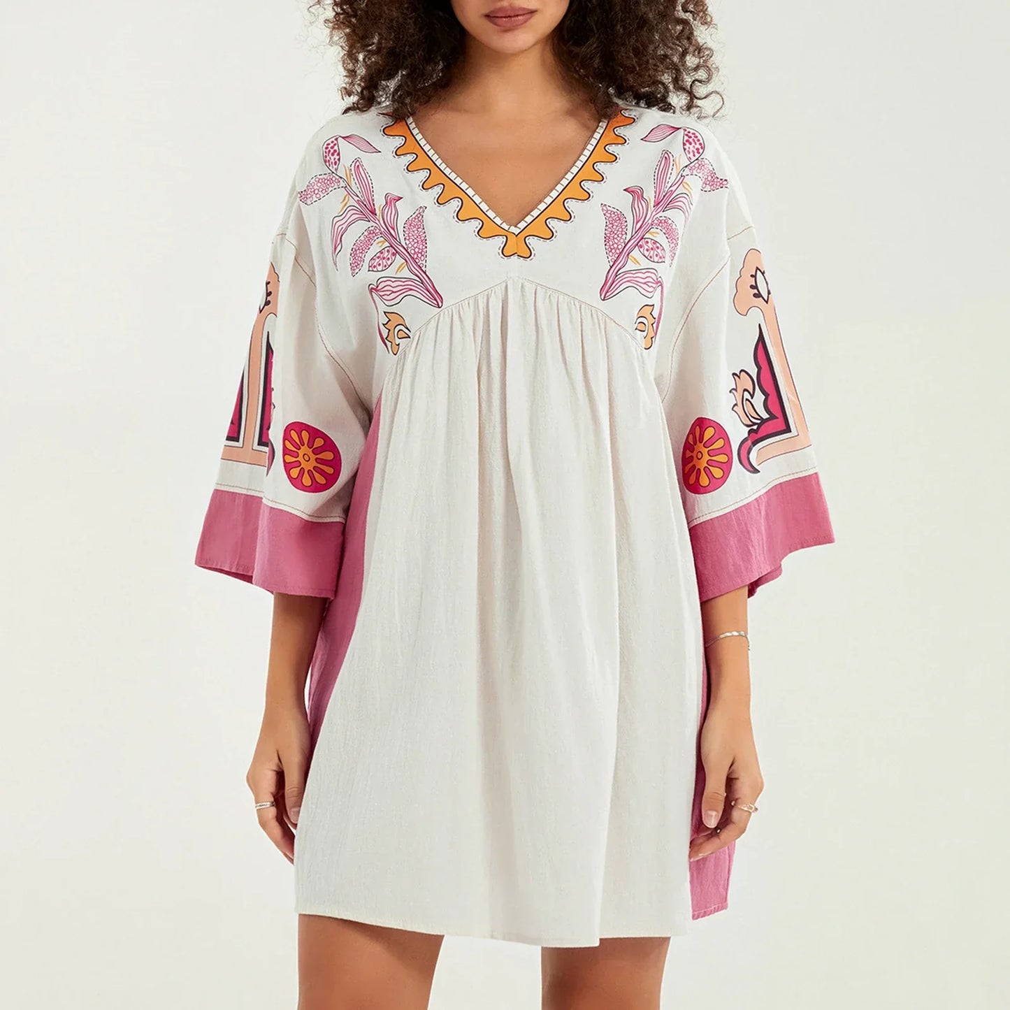 Mabelle – Dames tuniekjurk met v-hals en geborduurde details