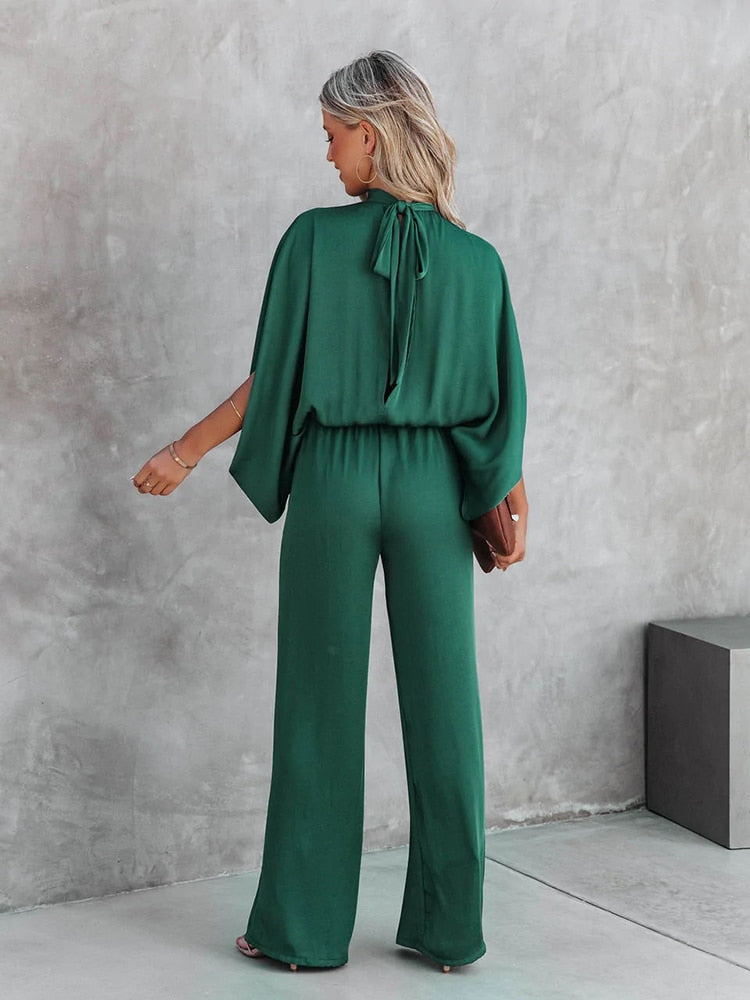 Elegant vrouwelijke jumpsuit groen lente 2025