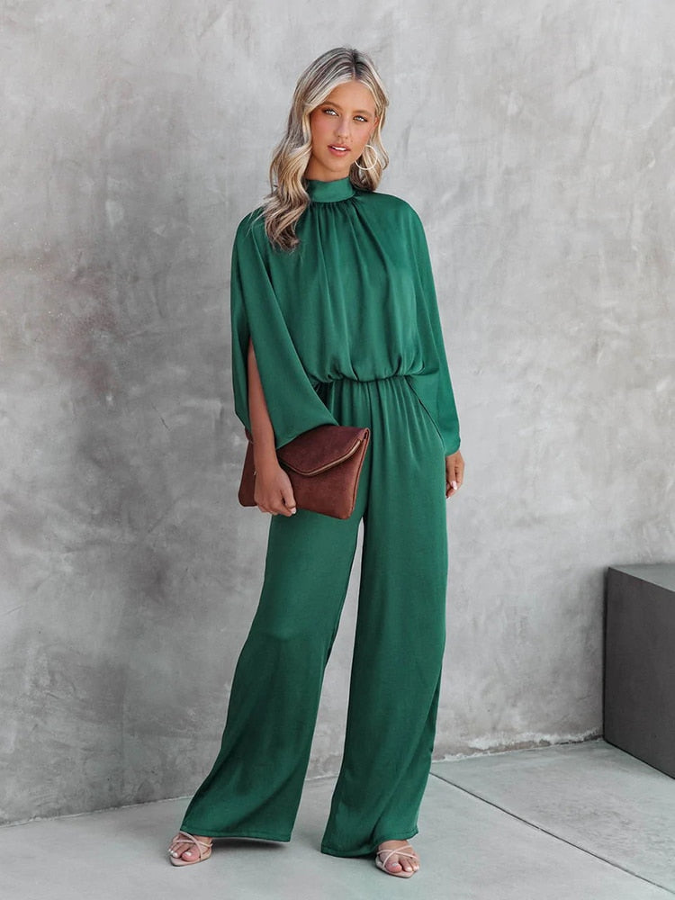 Elegant vrouwelijke jumpsuit groen lente 2025