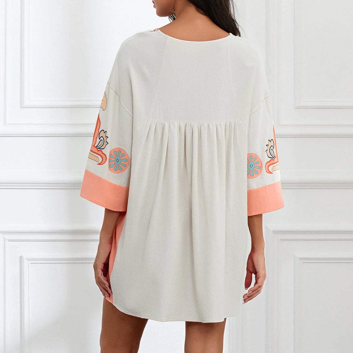 Mabelle – Dames tuniekjurk met v-hals en geborduurde details