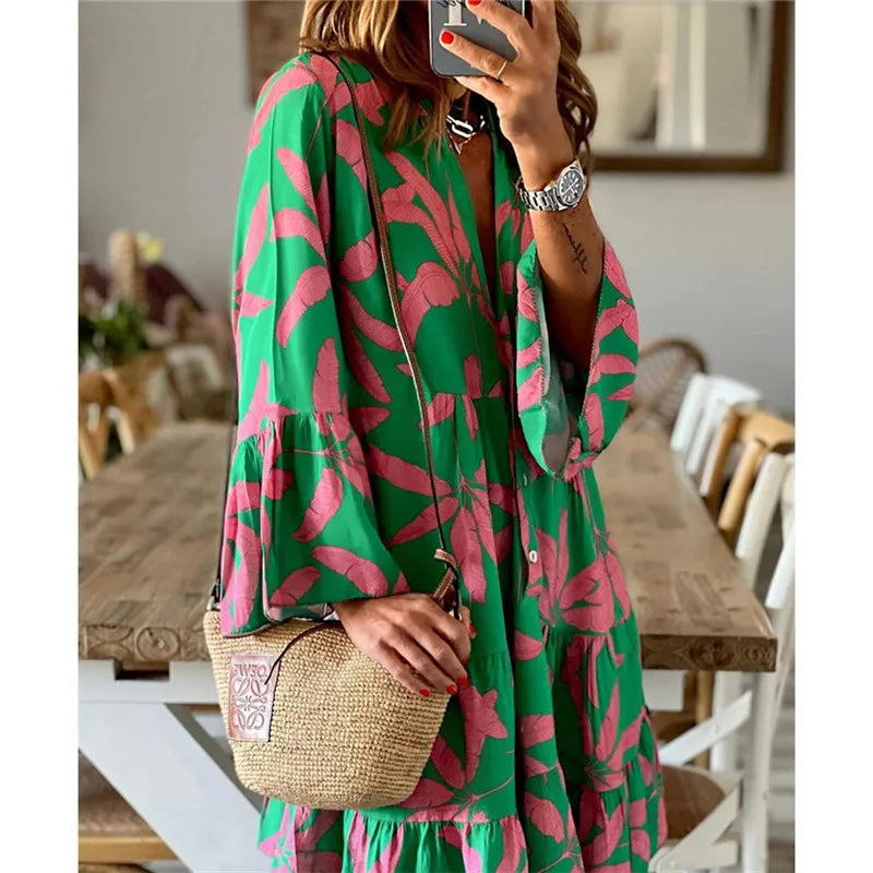 Theodelinda - Korte zomerjurk met print en volantzoom