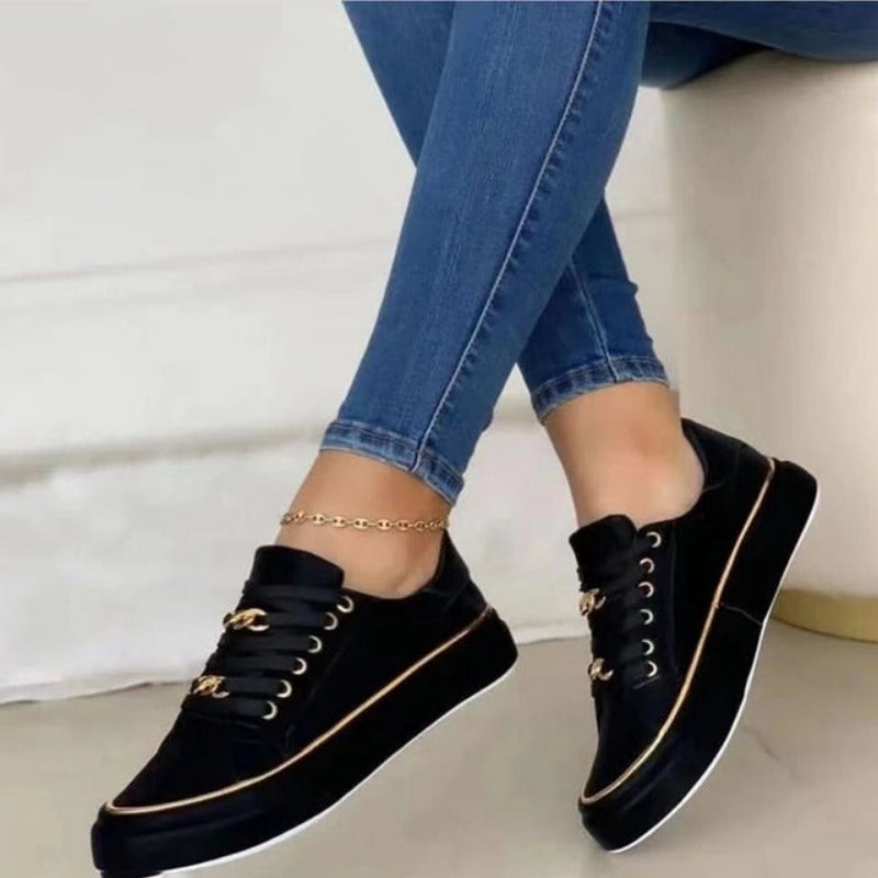 Kate – Lage damessneakers met gouden accenten