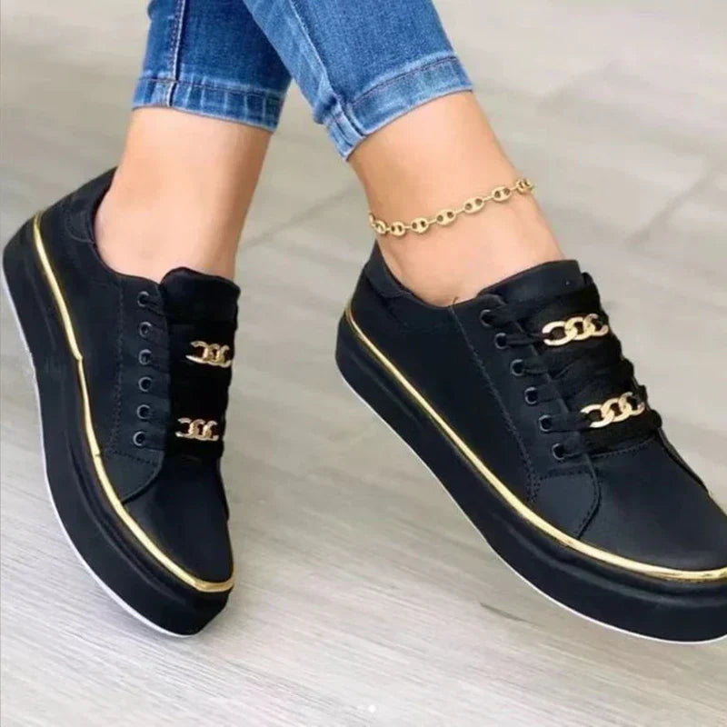 Kate – Lage damessneakers met gouden accenten