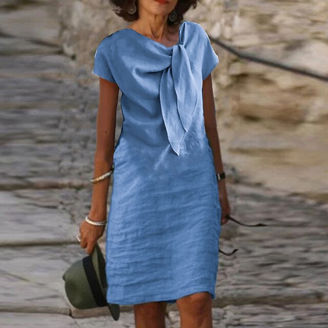 Tullia | Elegante jurk met strikdetail