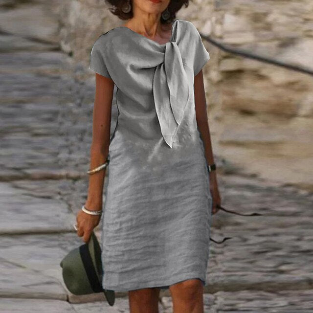 Tullia | Elegante jurk met strikdetail