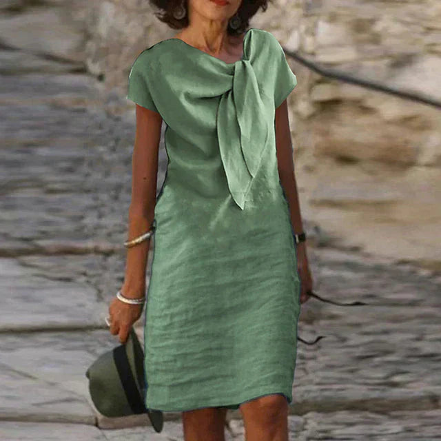 Tullia | Elegante jurk met strikdetail