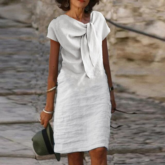 Tullia | Elegante jurk met strikdetail