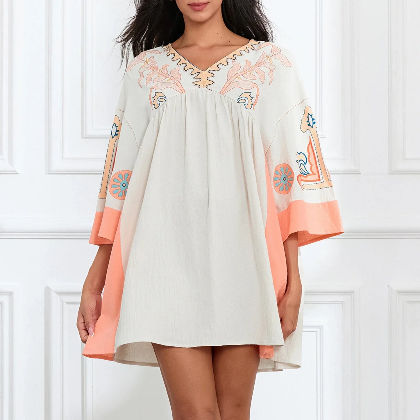 Mabelle – Dames tuniekjurk met v-hals en geborduurde details