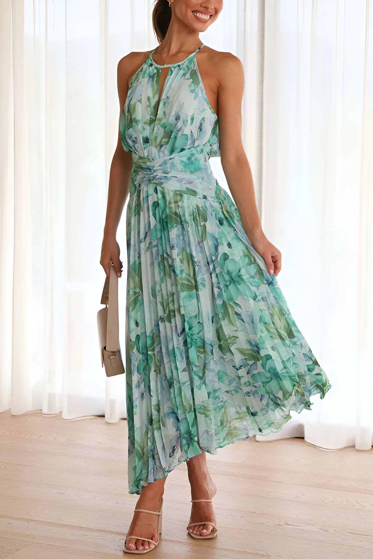 Gytha - Maxi hakter jurk met plissé en florale print