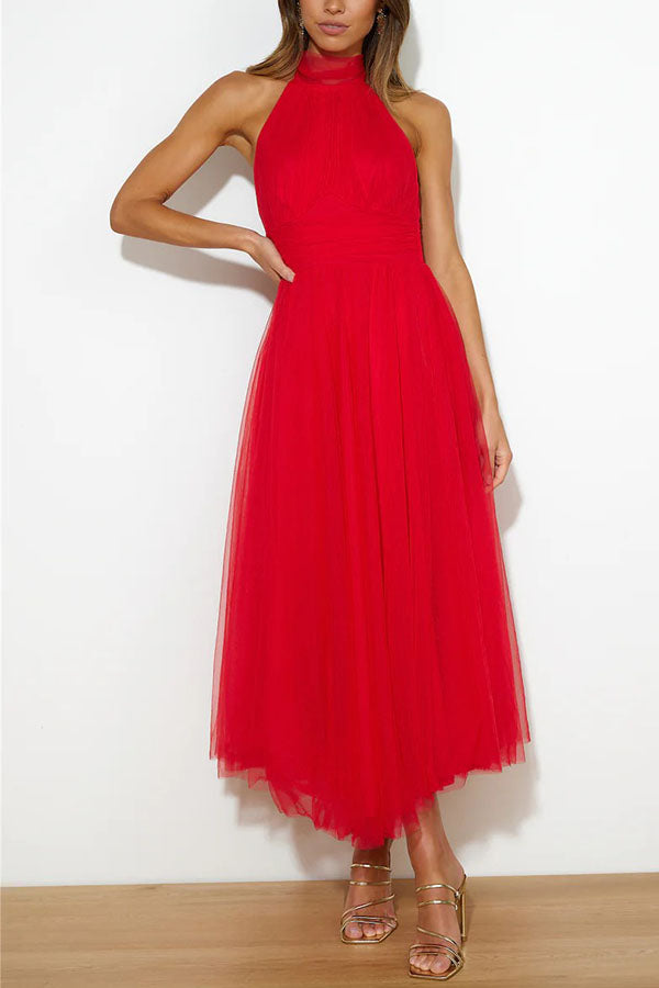 Fidelia - Halter midi jurk met volumineuze rok