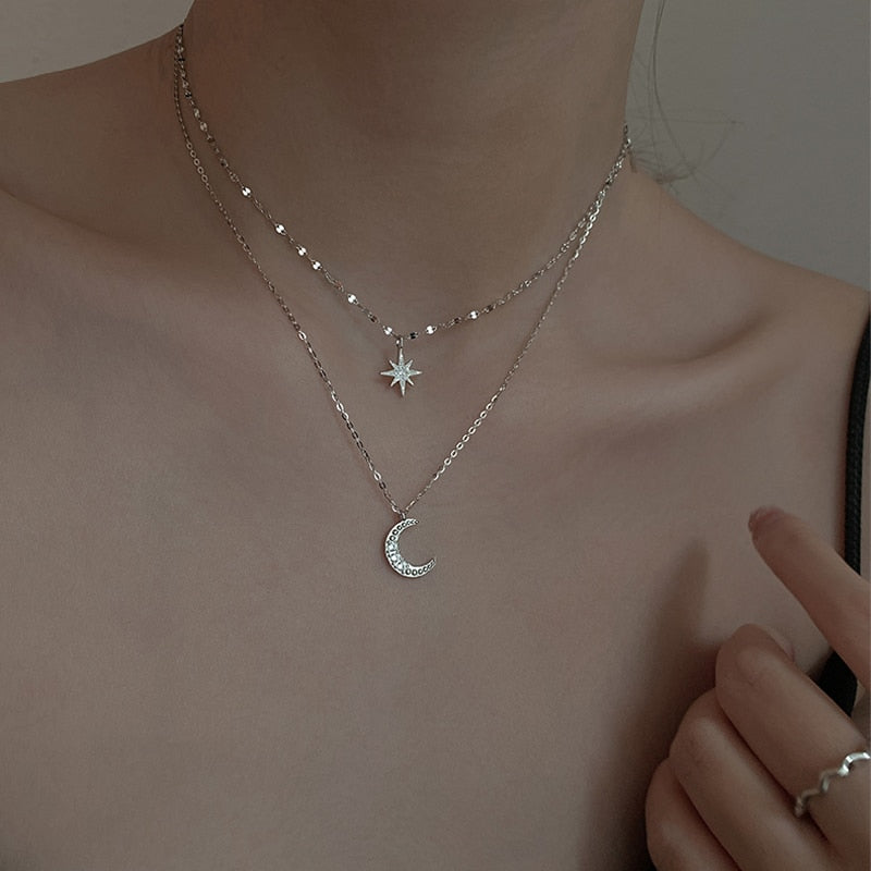 Isabella – Gelaagde damesketting met maan- en sterhanger