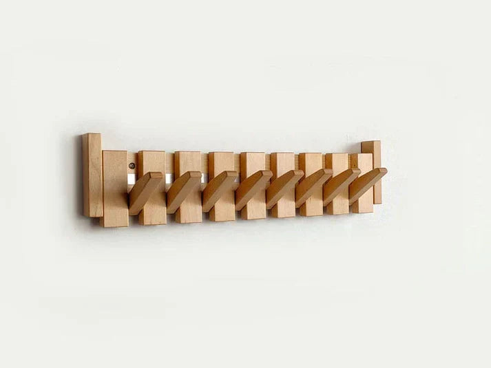 Wandgarderobe van hout met opklapbare haken