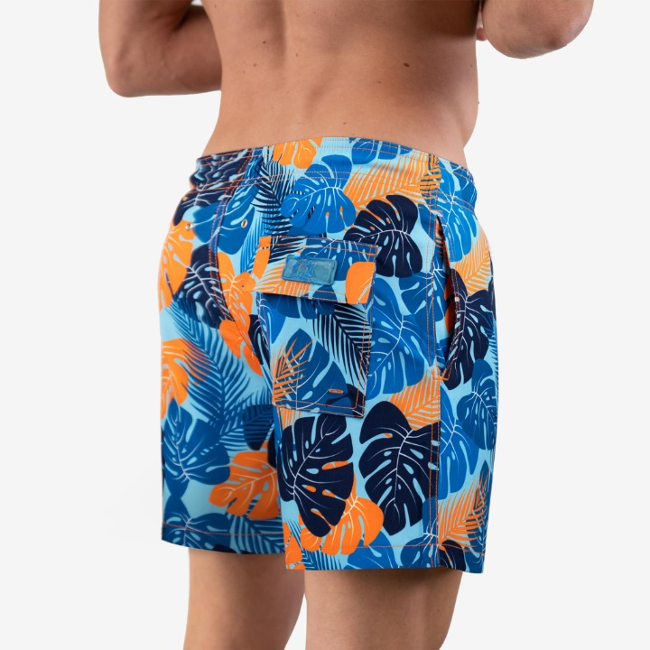 Fionn - Heren mid-length zwemshort met tropisch bladerpatroon en binnenbroek