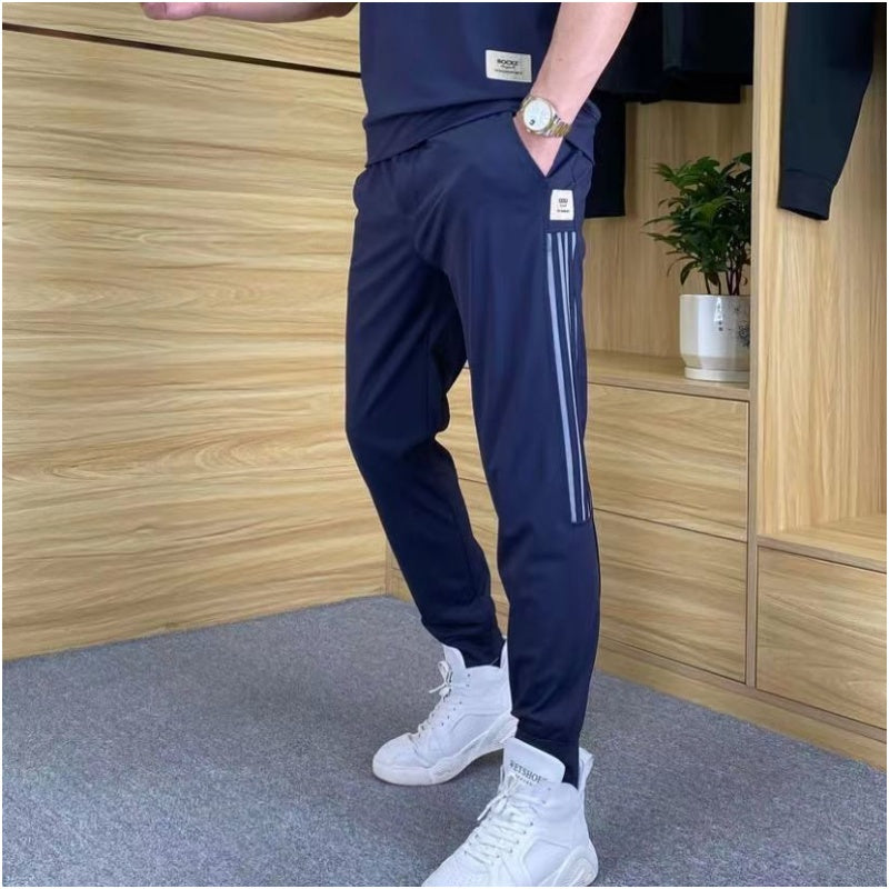 Rinaldo - Heren trainingspak met tapered broek en ronde hals top