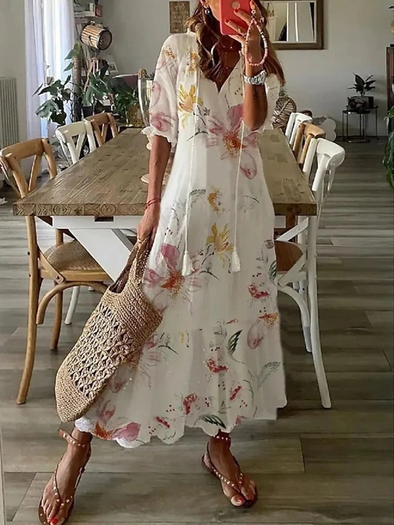 Isabella – Lange bloemenjurk met strikdetail en kraag voor dames