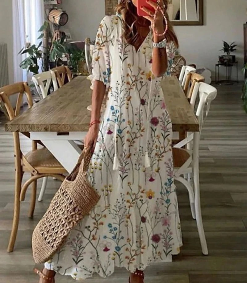 Isabella – Lange bloemenjurk met strikdetail en kraag voor dames