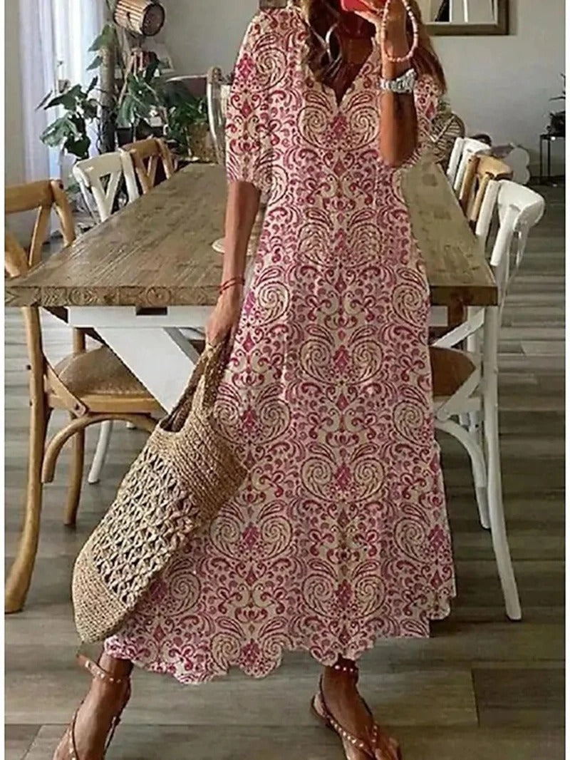Isabella – Lange bloemenjurk met strikdetail en kraag voor dames