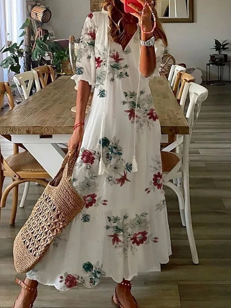 Isabella – Lange bloemenjurk met strikdetail en kraag voor dames