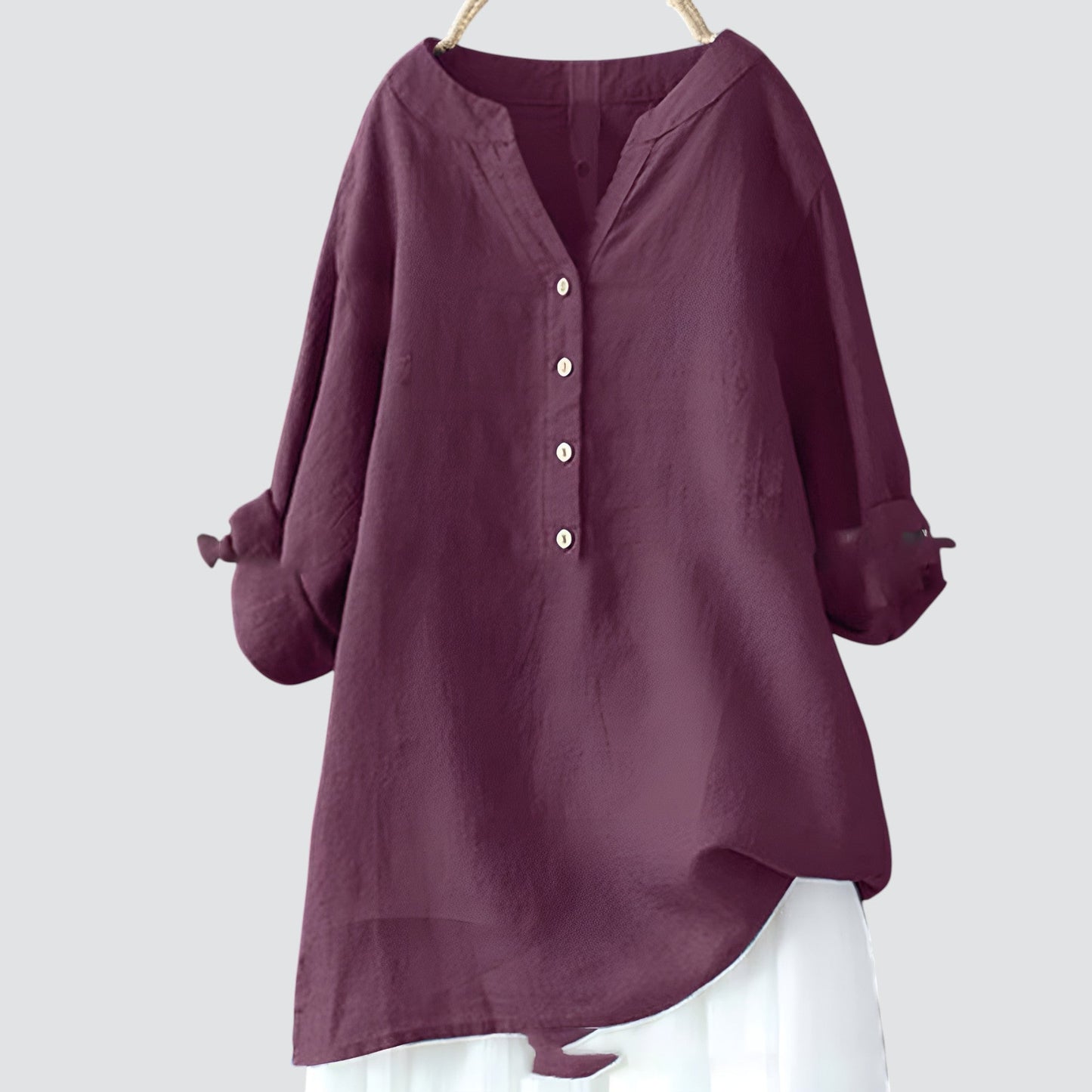 Olimpia - Oversized dames blouse met knopen en asymmetrische zoom