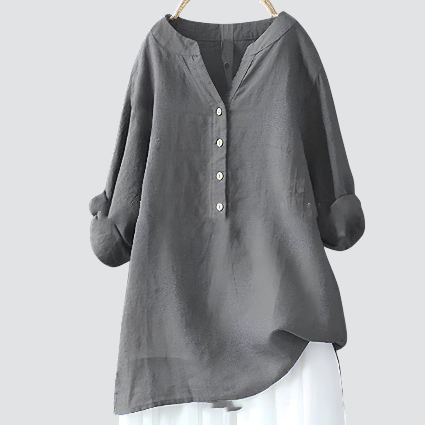 Olimpia - Oversized dames blouse met knopen en asymmetrische zoom