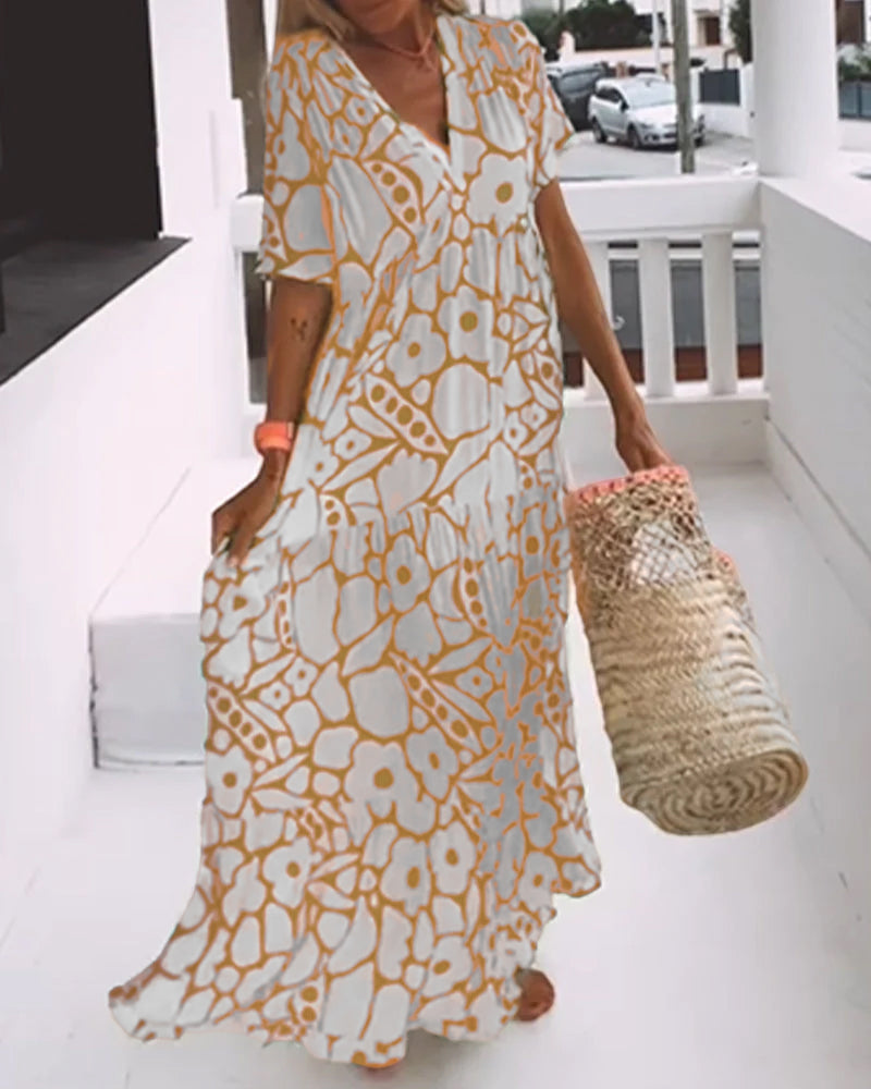 Melania – Luchtige maxi-jurk met abstracte bloemenprint