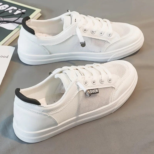 Stela - Dames lage sneakers met meshpanelen en veterdetail