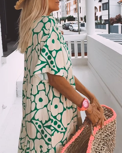 Melania – Luchtige maxi-jurk met abstracte bloemenprint