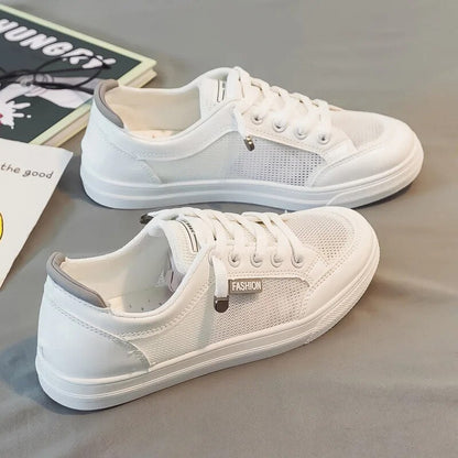 Stela - Dames lage sneakers met meshpanelen en veterdetail