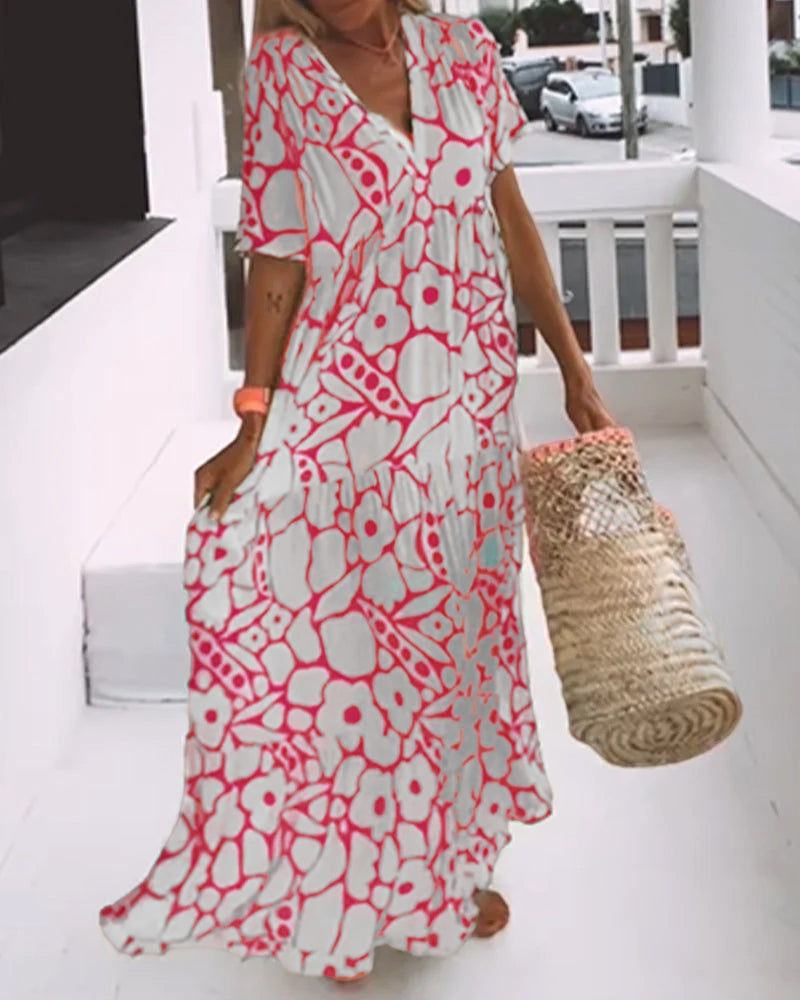 Melania – Luchtige maxi-jurk met abstracte bloemenprint