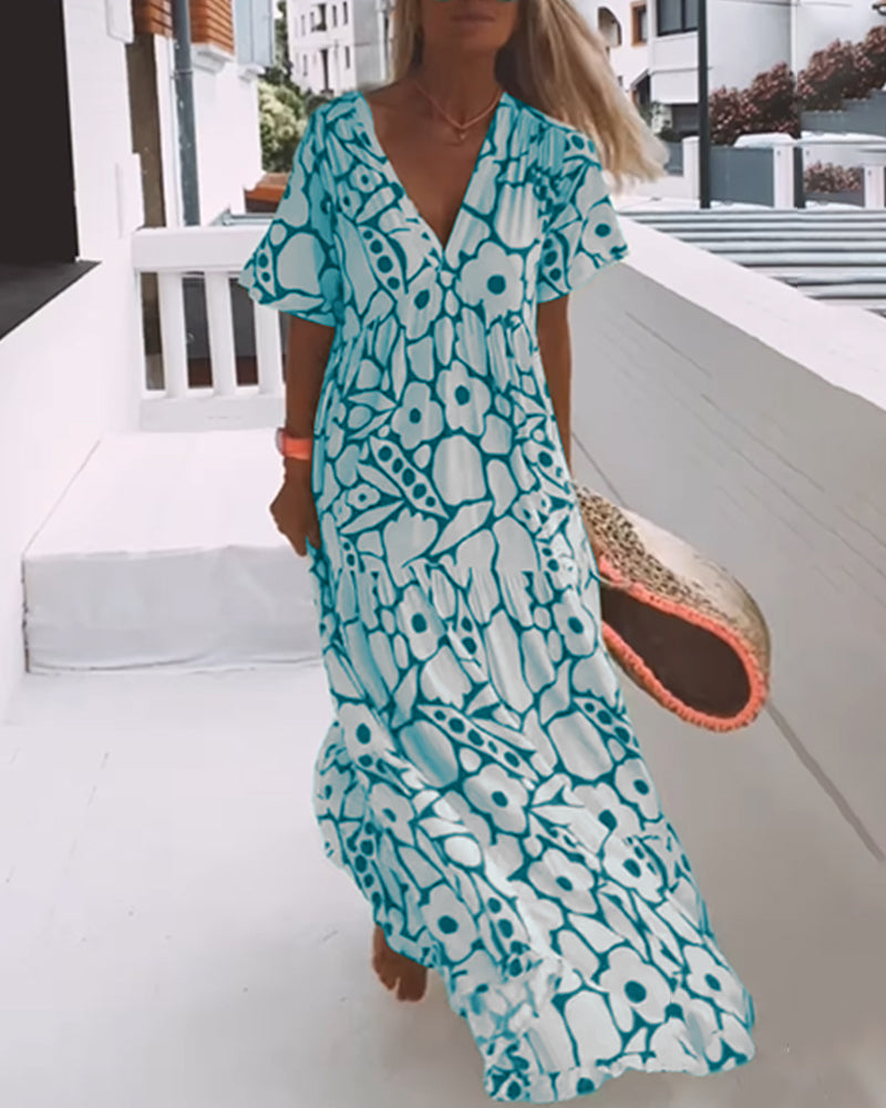 Melania – Luchtige maxi-jurk met abstracte bloemenprint