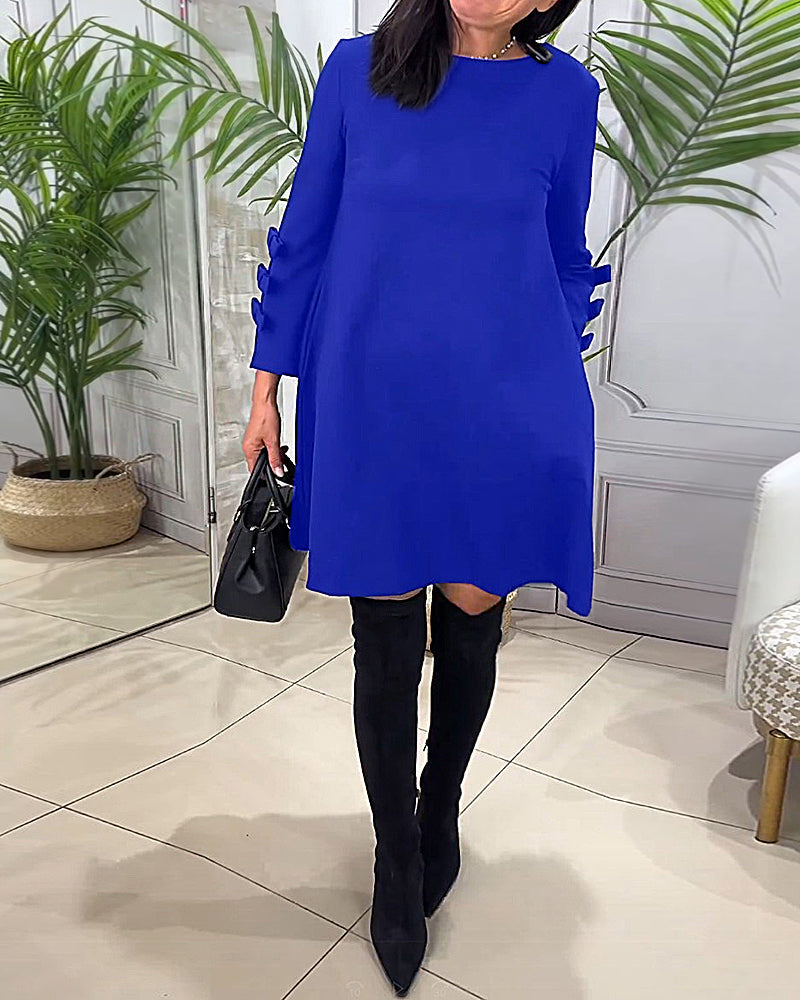 Monique - Women's A-line dress with sleeve bow detailing