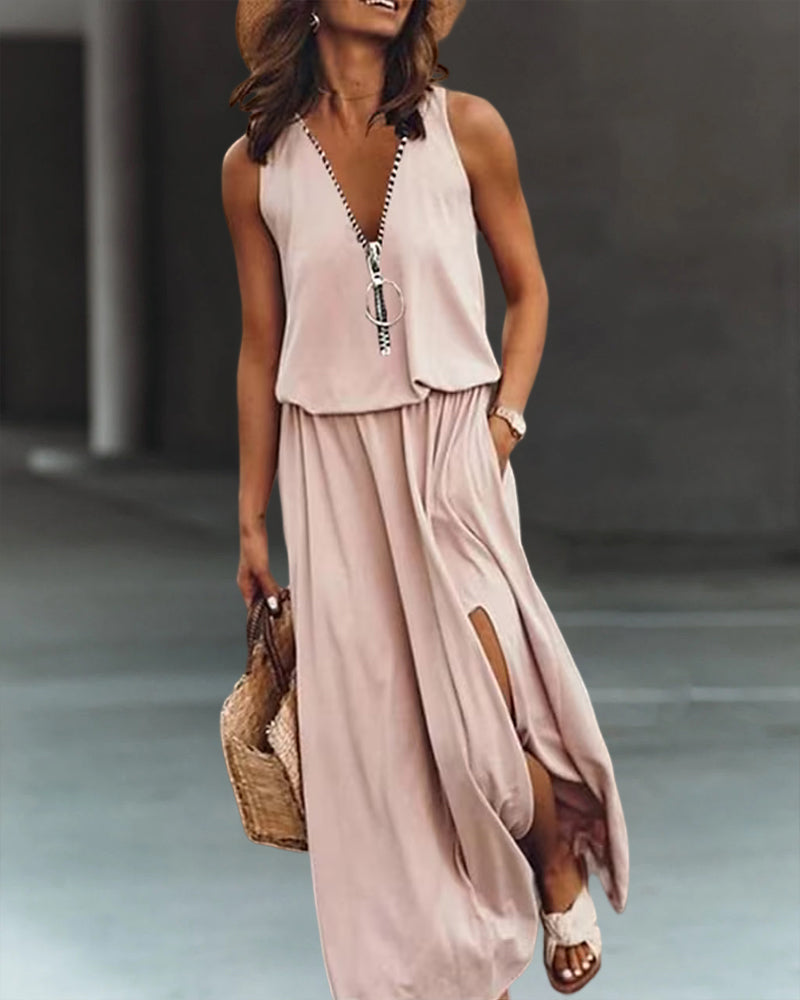 Stacey – Losvallende jurk met diepe V-hals en ritsdetail