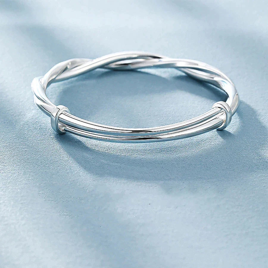 Damesarmband met gevlochten glans en vloeiende twist