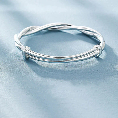 Damesarmband met gevlochten glans en vloeiende twist