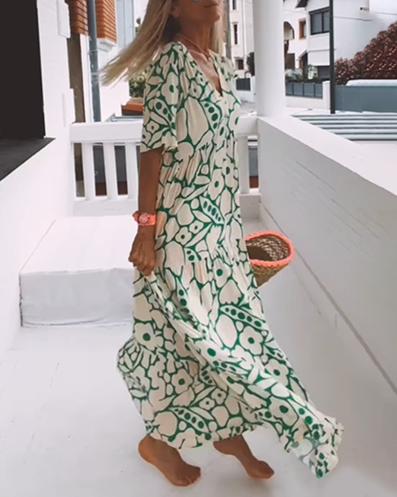 Melania – Luchtige maxi-jurk met abstracte bloemenprint