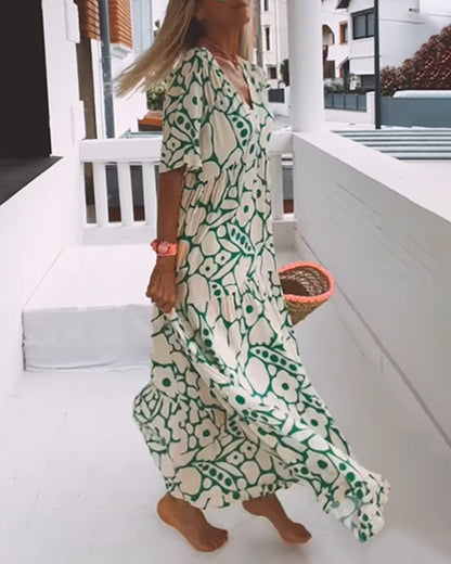 Melania – Luchtige maxi-jurk met abstracte bloemenprint